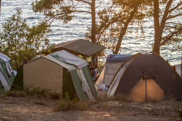 Camping side shoot near sea at sunset time