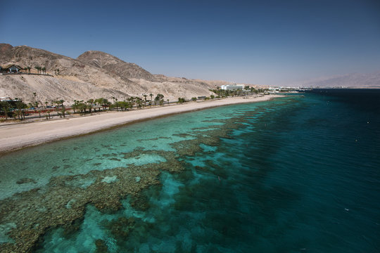 View to the coral reef and the beach in the Gulf of Eilat, Israel, Red Sea