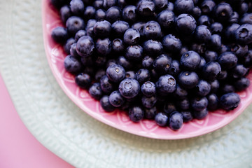 Blueberry berries in a plate.
