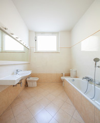 Fototapeta na wymiar Bright bathroom with tiles
