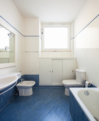 Fototapeta na wymiar Bright bathroom with tiles