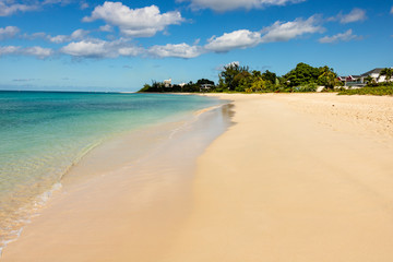Peaceful seascape, paradise beach with clear and colorful water and clean sand in Barbados.