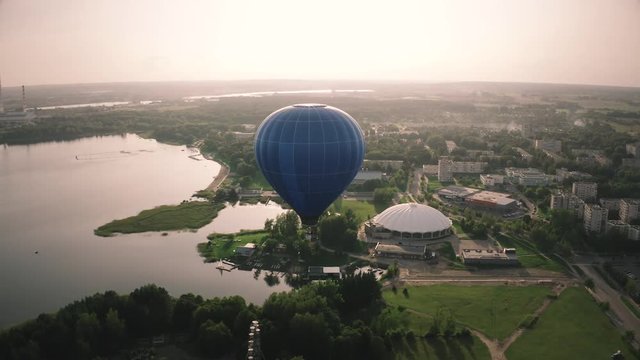 Hot Air Balloon Above Urban Lake City, Aerial View