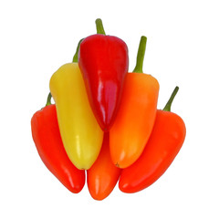 Pyramid of fresh hot peppers of yellow, orange and red color, front view, isolated on white background