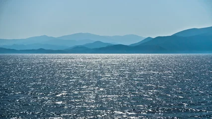 Photo sur Plexiglas Côte Panorama of North Aegean sea at the entrance to Volos bay on a sunny summer afternoon in Greece