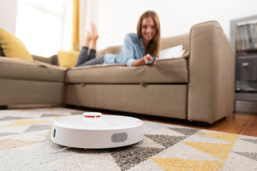 Robotic vacuum cleaner cleaning the room