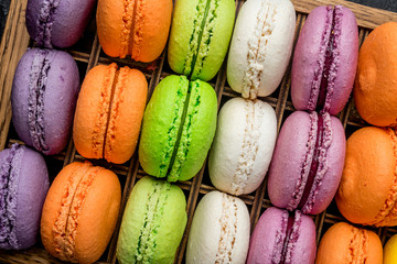 multicolored macaroons in box