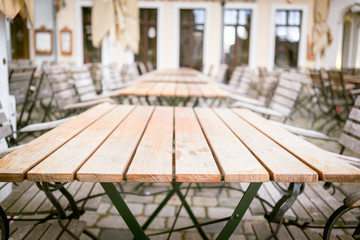 Table of a street cafe in a European city. Toned photo