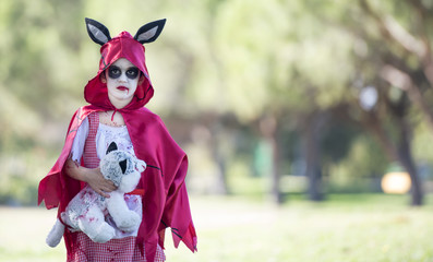 beautiful little girl dressed up for Halloween