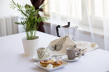 Homemade sweet breakfast of coffee and meringue and pasticiotto leccese