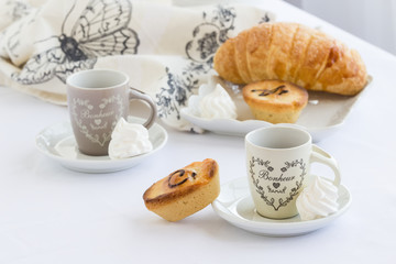 Cup of coffee with pasticciotto pastry on a white background, italian traditional breakfast, Salento, Apulia, southen Italy