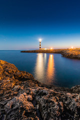 Fototapeta na wymiar Artrutx Lighthouse in Minorca, Spain.