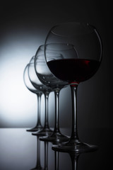 Glasses of red wine.