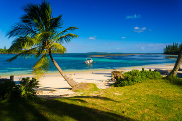 Empty abandoned quiet island with sea green bule water and cloudy sky with forest rock and trees for vacation holiday destination for cruise ship