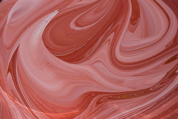 Photos of manufacturing a paint composite color. Mixing acrylic paint in different colors. Marbleized.