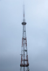 TV Tower in fog. Foggy morning in Lviv, Western Ukraine. Cold and wet spring weather.