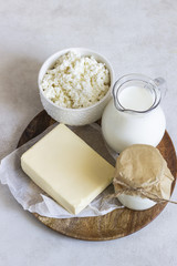 Different dairy products on a light background. Tasty healthy milk products.