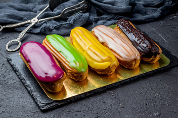 colorful eclairs on black