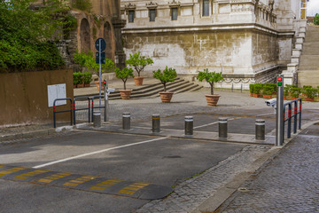 Rome, Italy automatic road barriers. Rising bollards with traffic control lights regulating traffic to the Capitoline Hill of the Roman capital.