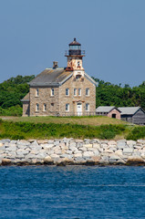 Fototapeta na wymiar Plum Island Light is located on the western end of Plum Island, which lies east of Orient Point which in turn is at the end of the North Fork of Long Island in the US state of New York.