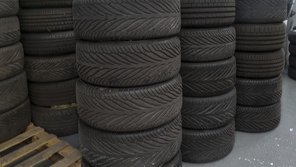 Obraz premium Stacks of car tyres