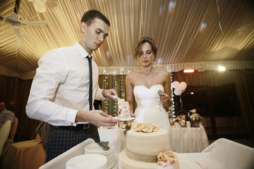 Bride in a white dress at a wedding is beautifully solemn