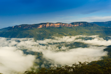 Empty quiet peaceul mountain horizon view of lake forest tree top of hill for zen meditation mind body soul spirit retreat with water fall