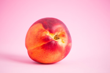 Nectarines on a colored background