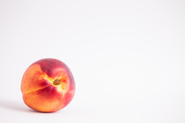 Nectarines on a colored background
