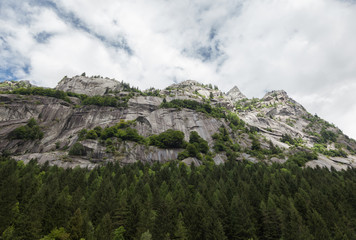 Fototapeta na wymiar Mountain landscape in Val di Mello in a sunny day - lombardy.