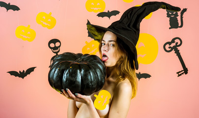 Halloween dresses and witch costumes and witch hats. Happy halloween. Happy smiling woman on...