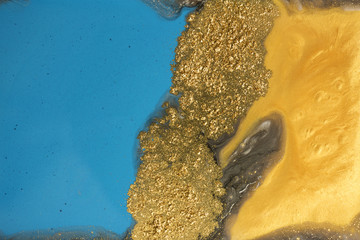 Fototapeta na wymiar Gold marbling texture design. Blue and golden marble pattern. Fluid art.
