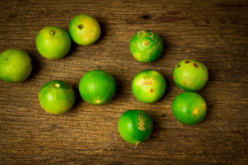 lime on choppping board wood on wood. wood background