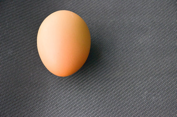 egg on a black background,