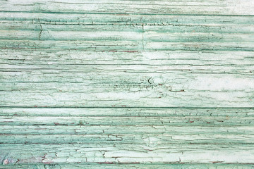 Holzdielen mit abgeblätterter Farbe als Hintergrund