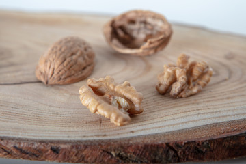 Walnuts on a wooden plate  ..