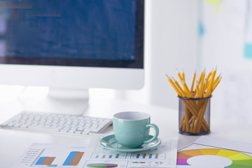 A cup of coffee on the office table