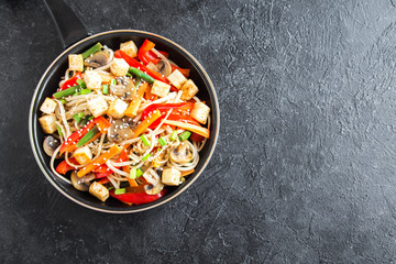 Stir fry with noodles, tofu and vegetables