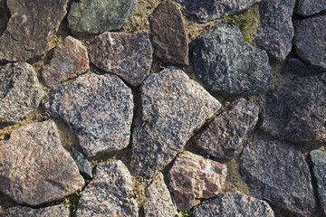 Paved hand-made track from different shapes stones