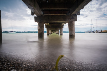 Long Exposure under the Beach Pier.