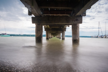 Long Exposure under the Beach Pier.