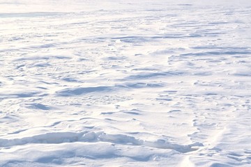 Snowy surface of the plain. Kostroma, Russia.