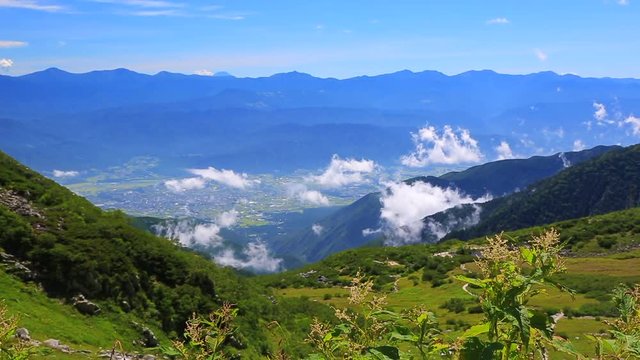 Summer landscape overlooking the Southern Alps in Prefeture Nagano, Japan. Time Lapse.

