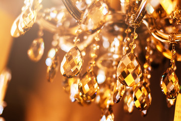 abstract image background of blur bokeh and crystal chandelier light equipment filter tone color...