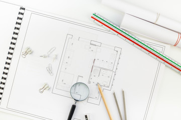 Interior designer table workplace with house plan