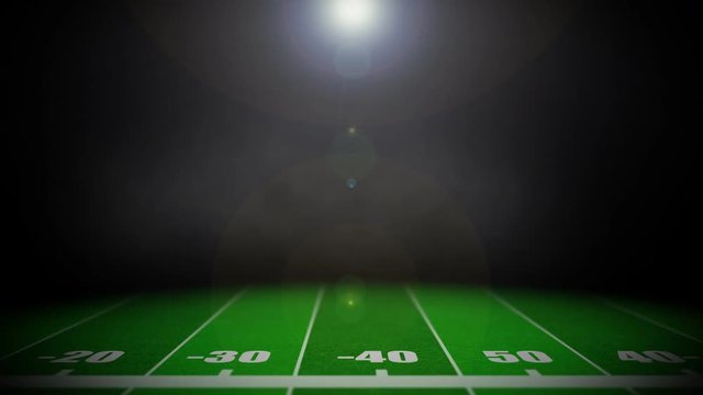 An animated American football field background with dramatic smoke and lens flare.	