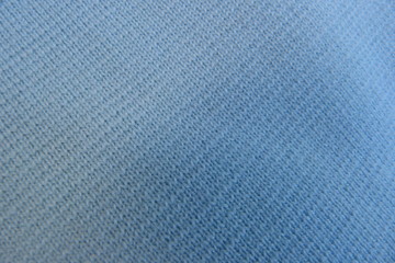 Fototapeta na wymiar blue woolen fabric close-up knitted fabric wool