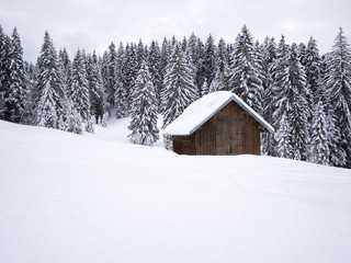 Drying-frame in snowy mountain landscape