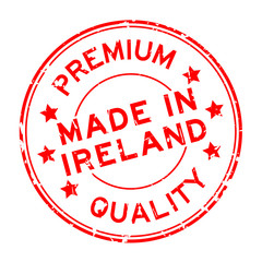 Grunge red premium quality made in Ireland round rubber seal stamp on white background