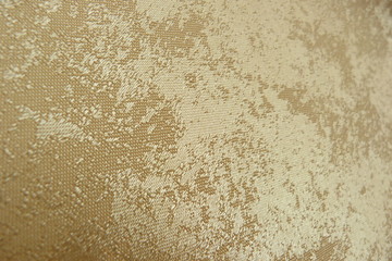 shiny golden fabric close-up of brocade organza